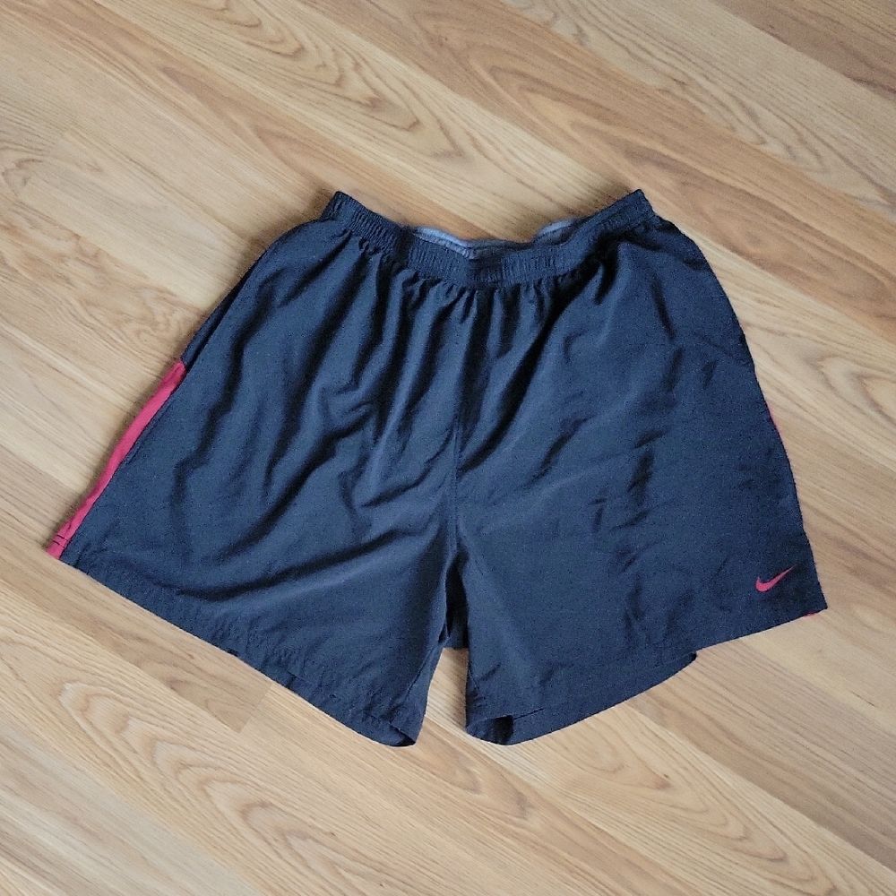 Nike Black Shorts with Pink Swoosh and Side Stripe